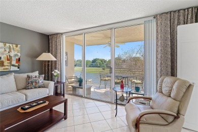 Welcome HOME to this updated corner unit with an open-concept on Palm-Aire Country Club and Resort - The Oaks in Florida - for sale on GolfHomes.com, golf home, golf lot