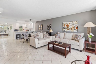 Welcome HOME to this updated corner unit with an open-concept on Palm-Aire Country Club and Resort - The Oaks in Florida - for sale on GolfHomes.com, golf home, golf lot