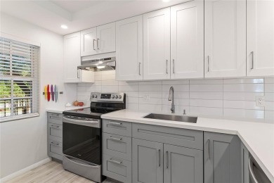 Welcome HOME to this updated corner unit with an open-concept on Palm-Aire Country Club and Resort - The Oaks in Florida - for sale on GolfHomes.com, golf home, golf lot