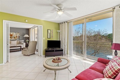 Welcome HOME to this updated corner unit with an open-concept on Palm-Aire Country Club and Resort - The Oaks in Florida - for sale on GolfHomes.com, golf home, golf lot