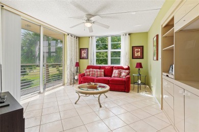 Welcome HOME to this updated corner unit with an open-concept on Palm-Aire Country Club and Resort - The Oaks in Florida - for sale on GolfHomes.com, golf home, golf lot