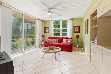 Welcome HOME to this updated corner unit with an open-concept on Palm-Aire Country Club and Resort - The Oaks in Florida - for sale on GolfHomes.com, golf home, golf lot