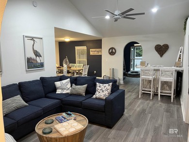 Coastal charm meets comfort in this move-in ready 3-bedroom on Orange Beach Golf Center in Alabama - for sale on GolfHomes.com, golf home, golf lot