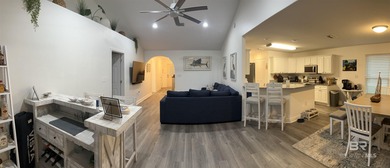 Coastal charm meets comfort in this move-in ready 3-bedroom on Orange Beach Golf Center in Alabama - for sale on GolfHomes.com, golf home, golf lot