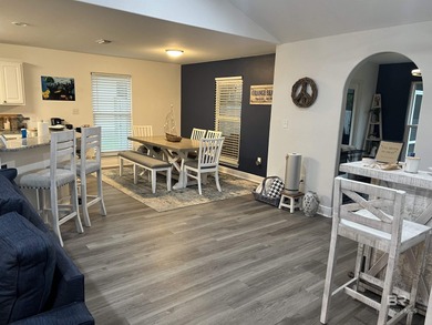 Coastal charm meets comfort in this move-in ready 3-bedroom on Orange Beach Golf Center in Alabama - for sale on GolfHomes.com, golf home, golf lot