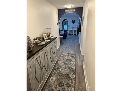 Coastal charm meets comfort in this move-in ready 3-bedroom on Orange Beach Golf Center in Alabama - for sale on GolfHomes.com, golf home, golf lot