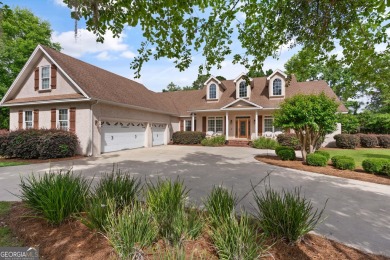Discover serene outdoor living at 106 Majestic Drive on Oak on Oak Grove Island Golf and Country Club in Georgia - for sale on GolfHomes.com, golf home, golf lot