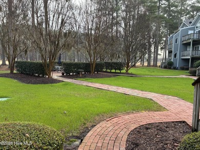 Precious one-bedroom condo featuring recent renovations and on Sound Golf Links at Albemarle Plantation in North Carolina - for sale on GolfHomes.com, golf home, golf lot