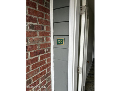 Precious one-bedroom condo featuring recent renovations and on Sound Golf Links at Albemarle Plantation in North Carolina - for sale on GolfHomes.com, golf home, golf lot