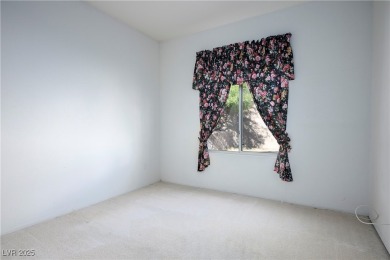 This sought-after Regal model single-family residence offers 2 on Highland Falls Golf Club in Nevada - for sale on GolfHomes.com, golf home, golf lot