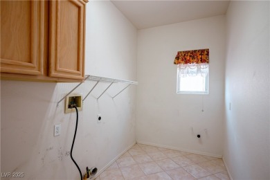 This sought-after Regal model single-family residence offers 2 on Highland Falls Golf Club in Nevada - for sale on GolfHomes.com, golf home, golf lot