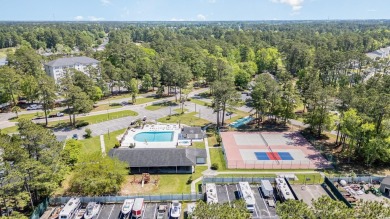 Discover your perfect retreat in this efficiency unit located in on Heron Point Golf Club in South Carolina - for sale on GolfHomes.com, golf home, golf lot