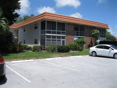 Come see this partial updated first floor condo in the heart of on Pine Lakes Golf Club in Florida - for sale on GolfHomes.com, golf home, golf lot