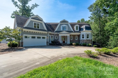 Experience lakefront living at its finest in this stunning on Old North State Club at Uwharrie Point Golf community in North Carolina - for sale on GolfHomes.com, golf home, golf lot