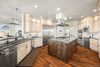 Located in the golf course community of Kings Deer, this on Kings Deer Golf Club in Colorado - for sale on GolfHomes.com, golf home, golf lot