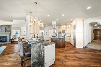 Located in the golf course community of Kings Deer, this on Kings Deer Golf Club in Colorado - for sale on GolfHomes.com, golf home, golf lot