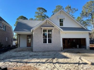 Custom designed home by Southern Engineering & constructed by on Carolina National Golf Club in North Carolina - for sale on GolfHomes.com, golf home, golf lot