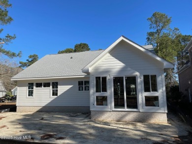 Custom designed home by Southern Engineering & constructed by on Carolina National Golf Club in North Carolina - for sale on GolfHomes.com, golf home, golf lot