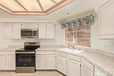 Welcome to a charming home on a premier golf course lot in Red on Red Mountain Ranch Country Club in Arizona - for sale on GolfHomes.com, golf home, golf lot