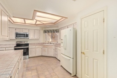 Welcome to a charming home on a premier golf course lot in Red on Red Mountain Ranch Country Club in Arizona - for sale on GolfHomes.com, golf home, golf lot