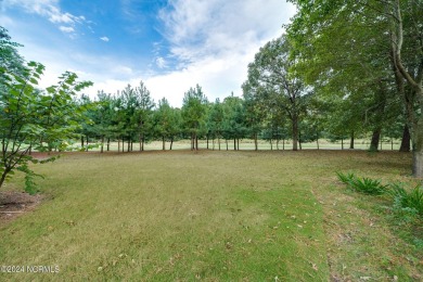 Welcome to 122 Pilot House Drive located inside River Landing, a on River Landing Golf Course in North Carolina - for sale on GolfHomes.com, golf home, golf lot