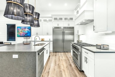 Seller is offering a $200,000 gross rental income guarantee for on Santa Rosa Golf and Beach Club in Florida - for sale on GolfHomes.com, golf home, golf lot
