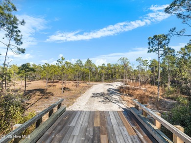 Price improvement! Welcome to an extraordinary 1.11-acre on Members Club At St. James Plantation in North Carolina - for sale on GolfHomes.com, golf home, golf lot
