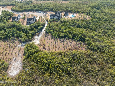 Price improvement! Welcome to an extraordinary 1.11-acre on Members Club At St. James Plantation in North Carolina - for sale on GolfHomes.com, golf home, golf lot