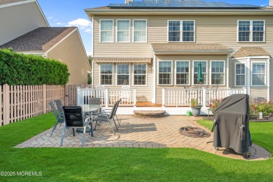 This elegant brick-front home offers the perfect blend of style on Knob Hill Golf Club in New Jersey - for sale on GolfHomes.com, golf home, golf lot