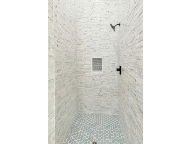Seller is offering a $200,000 gross rental income guarantee for on Santa Rosa Golf and Beach Club in Florida - for sale on GolfHomes.com, golf home, golf lot