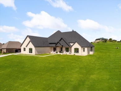 This beautifully maintained home sits on an expansive lot with on Canyon West Golf Club in Texas - for sale on GolfHomes.com, golf home, golf lot