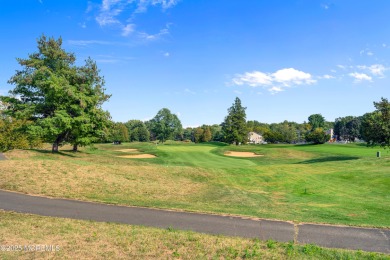 This elegant brick-front home offers the perfect blend of style on Knob Hill Golf Club in New Jersey - for sale on GolfHomes.com, golf home, golf lot