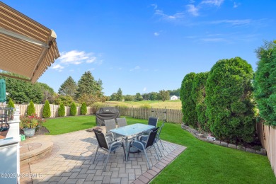 This elegant brick-front home offers the perfect blend of style on Knob Hill Golf Club in New Jersey - for sale on GolfHomes.com, golf home, golf lot