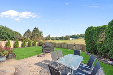 This elegant brick-front home offers the perfect blend of style on Knob Hill Golf Club in New Jersey - for sale on GolfHomes.com, golf home, golf lot