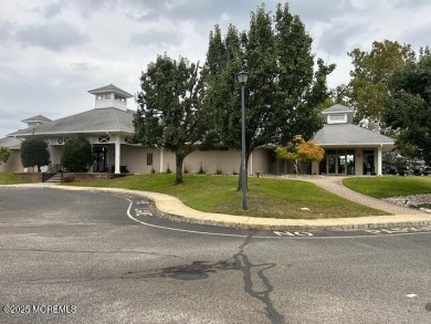 This elegant brick-front home offers the perfect blend of style on Knob Hill Golf Club in New Jersey - for sale on GolfHomes.com, golf home, golf lot
