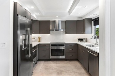 Experience exceptional living in this beautifully renovated on Gleneagles Golf and Country Club in Florida - for sale on GolfHomes.com, golf home, golf lot
