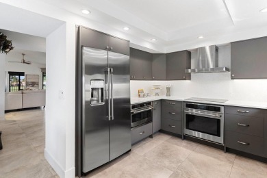 Experience exceptional living in this beautifully renovated on Gleneagles Golf and Country Club in Florida - for sale on GolfHomes.com, golf home, golf lot