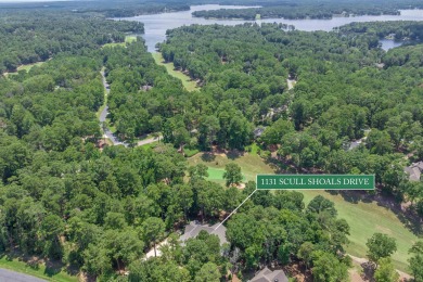 Overlooking the 4th green of the prestigious Preserve Golf on Reynolds Lake Oconee - The Oconee in Georgia - for sale on GolfHomes.com, golf home, golf lot
