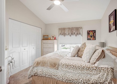 Nestled within a gated community, this spacious split-plan home on Fountains Golf and Country Club in Florida - for sale on GolfHomes.com, golf home, golf lot