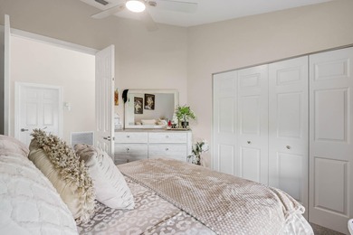 Nestled within a gated community, this spacious split-plan home on Fountains Golf and Country Club in Florida - for sale on GolfHomes.com, golf home, golf lot