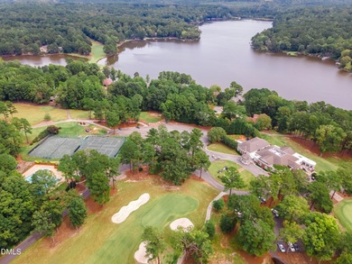 Welcome to your dream home in the exclusive gated community of on Carolina Trace Country Club in North Carolina - for sale on GolfHomes.com, golf home, golf lot