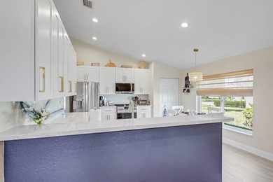 Nestled within a gated community, this spacious split-plan home on Fountains Golf and Country Club in Florida - for sale on GolfHomes.com, golf home, golf lot