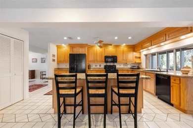 Looking for the perfect home to hold your larger-than-life on Palm Aire Country Club of Sarasota in Florida - for sale on GolfHomes.com, golf home, golf lot