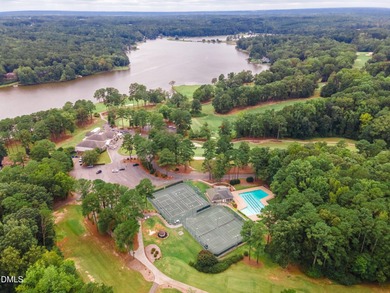 Welcome to your dream home in the exclusive gated community of on Carolina Trace Country Club in North Carolina - for sale on GolfHomes.com, golf home, golf lot