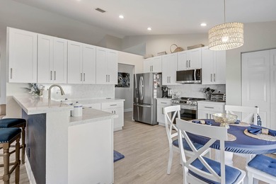 Nestled within a gated community, this spacious split-plan home on Fountains Golf and Country Club in Florida - for sale on GolfHomes.com, golf home, golf lot