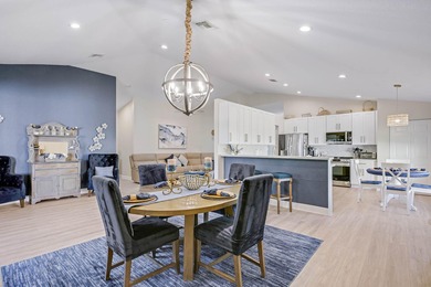 Nestled within a gated community, this spacious split-plan home on Fountains Golf and Country Club in Florida - for sale on GolfHomes.com, golf home, golf lot