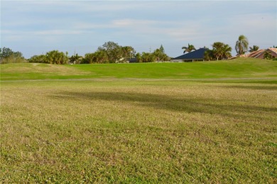 This lot is a golfer's dream! Located on a quiet street on Twin Isles Country Club in Florida - for sale on GolfHomes.com, golf home, golf lot