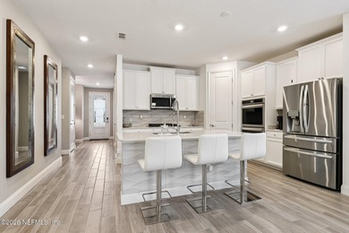 Spectacular home nestled on a quiet cul de sac in a premier on Cimarrone Golf and Country Club in Florida - for sale on GolfHomes.com, golf home, golf lot