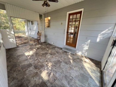 Charming and move-in ready, this beautifully updated 2-bedroom on Cherokee Village North Course in Arkansas - for sale on GolfHomes.com, golf home, golf lot