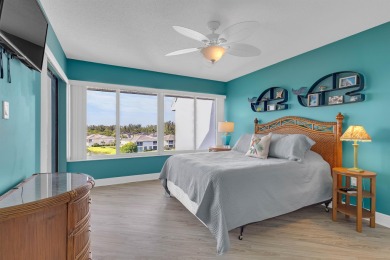 Top floor, high ceilings and expansive views of the river from on Ocean Village Golf Course in Florida - for sale on GolfHomes.com, golf home, golf lot